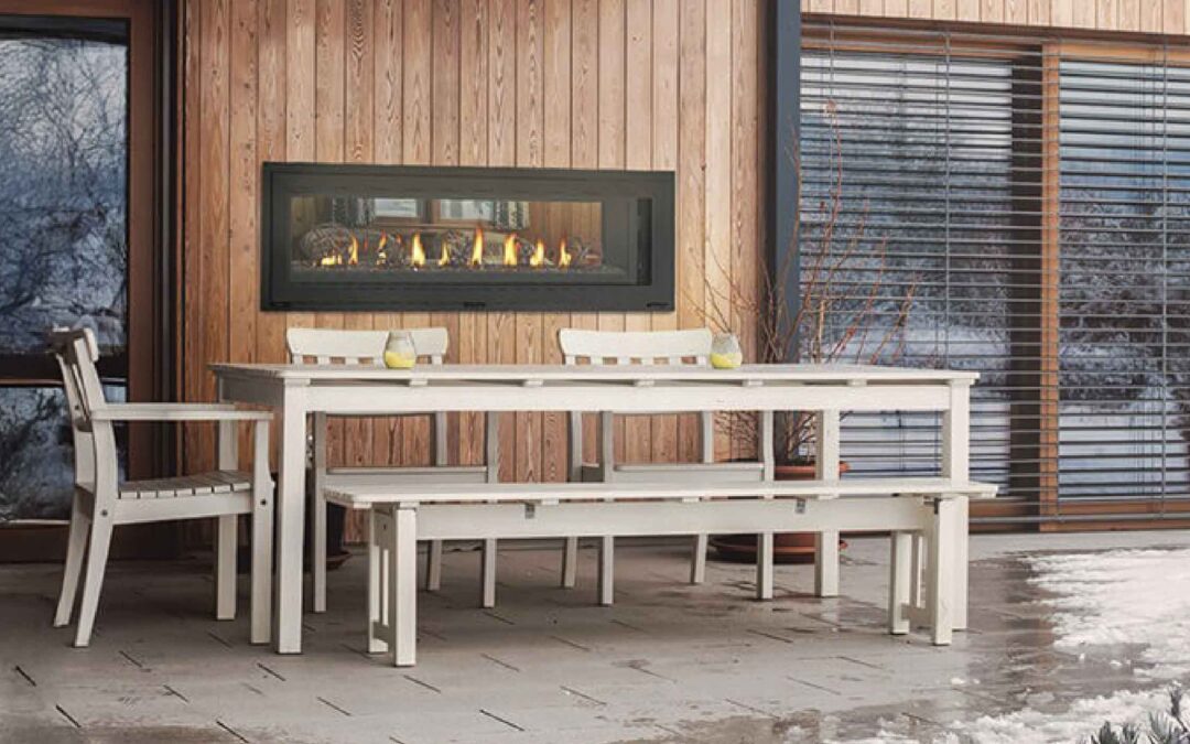 Enjoy the Best of Both Worlds With an Indoor-Outdoor Fireplace